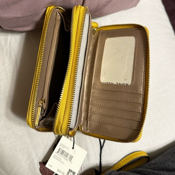 Brand new Anne Klein small wristlet w/ tags in a bright yellow color. - Picture 3 of 4